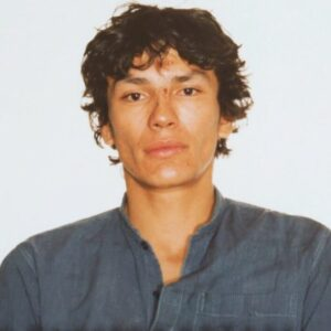 The Smiling Boy in This Photo Is Now Infamous for Shocking Reasons