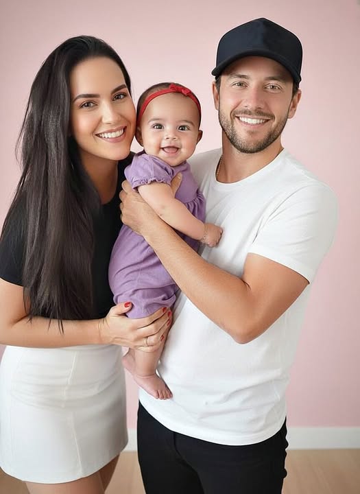 Young couple put daughter inside the fir… See more